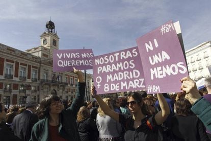 Women gather in central Madrid on Wednesday.