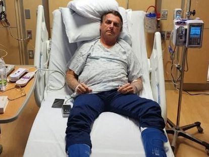 This handout photo obtained from the twitter account of Brazil's President Jair Bolsonaro (@jairbolsonaro), shows Brazil's former president Jair Bolsonaro on his hospital bed in Kissimmee, Florida, on January 9, 2023
