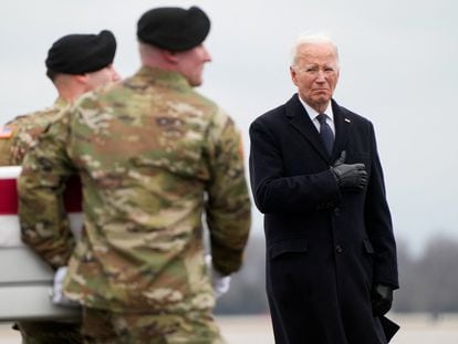 U.S. President Joe Biden stands before the coffin of one of the three soldiers who died in Jordan, at Dover Air Base, Delaware, on February 2, 2024.