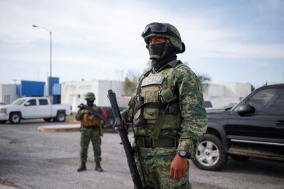 Soldiers stand guard outside the prosecutor's office and the facilities of the Forensic Medical Services, in Matamoros, Tamaulipas,, on March 7.