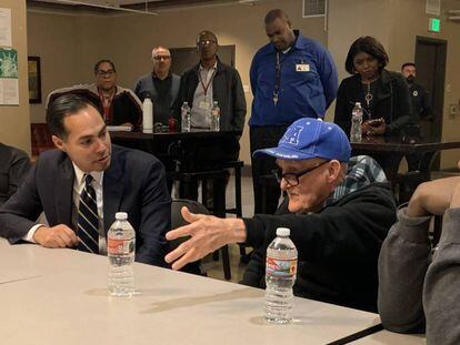 Castro (2nd l) at a panel discussion with homeless veterans in Los Angeles.