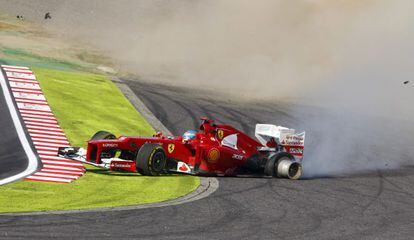 Alonso&#039;s Ferrari plows through the gravel at Sunday&#039;s Grand Prix. 