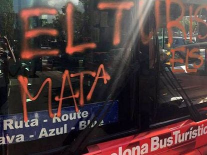 The bus was sprayed with the words “Tourism kills the barrio.”