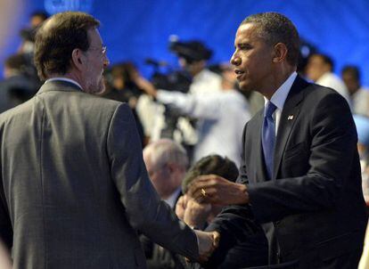 Prime Minister Mariano Rajoy greets President Barack Obama on Tuesday in Los Cabos, Mexico.