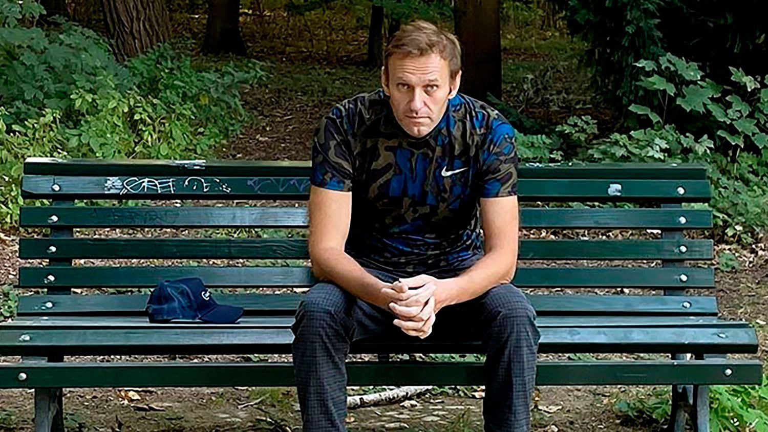 Russian opposition leader Alexei Navalny sitting on a bench in Berlin on September 23.