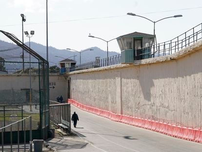 An inmate walks around the exercise yard at San Quentin State Prison on April 12, 2022, in San Quentin, Calif.