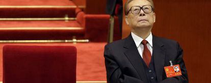 Jiang Zemin listens to a speech given by Hu Jintao in November 2012.