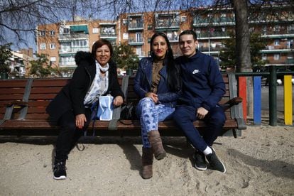 In Entrevías, it is common to see migrants and Spaniards form couples. Spaniard Borja Cayuela, 28, his Ecuadorian girlfriend Estefany Pinto, 30, and her mother, Olga Morocho, 55, pose for a photo.