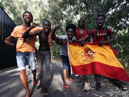 Migrants celebrate their arrival in Ceuta.