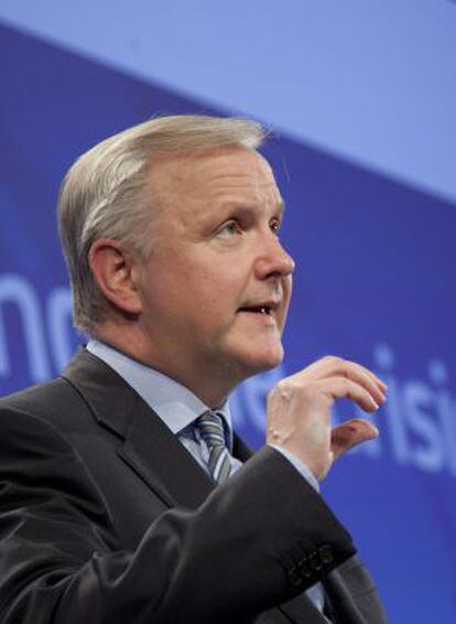European Economic Commissioner Olli Rehn speaks during a media conference at EU headquarters in Brussels on Wednesday.