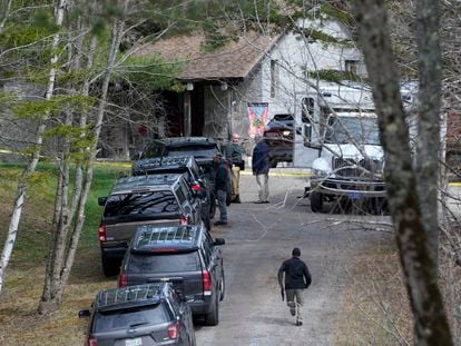 Investigators work at the scene of a deadly shooting, on April 18, 2023, in Bowdoin, Maine.
