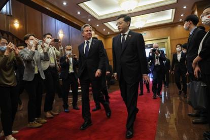 U.S. Secretary of State Antony Blinken walks with Chinese Foreign Minister Qin Gang at the Diaoyutai State Guesthouse in Beijing, China, on June 18, 2023.