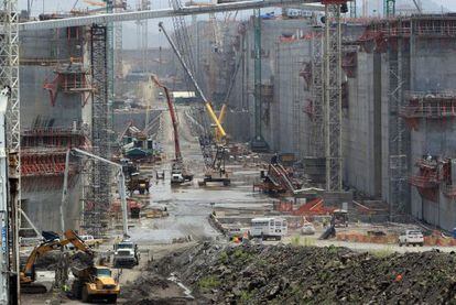 Work on the Panama Canal (above) was due to finish in October 2014.