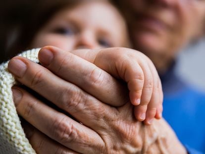 Children at the turn of the century will meet and spend several years with all of their grandparents and most of their great-grandparents. In the picture, a German grandmother holds her grandchild's hand.