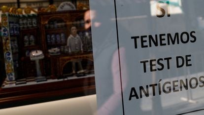 A sign outside a Madrid pharmacy on Wednesday advertising availability of antigen tests.