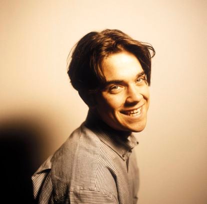 Portrait of a very young Robbie Williams in the early days of the band Take That.
