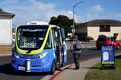 A driverless shuttle stops for a passenger on San Francisco's Treasure Island on Aug. 16, 2023.