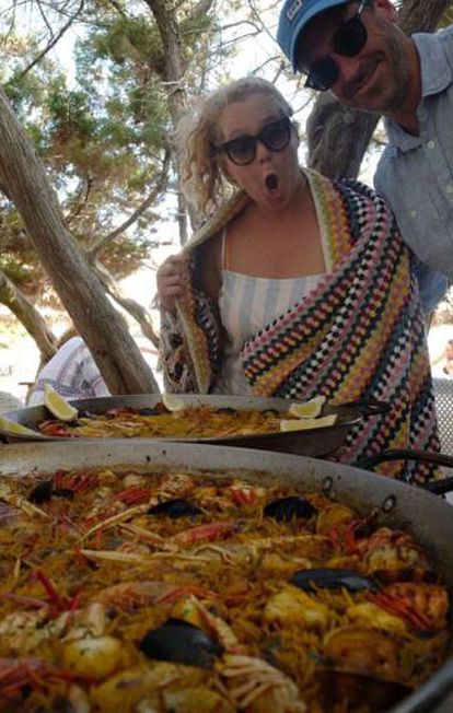 Amy Schumer shared a photo of herself with two paellas in July, 2018.