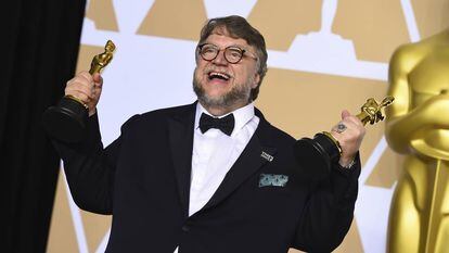 Guillermo del Toro with his two awards.