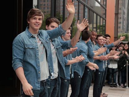 Abercrombie & Fitch models outside a former shop of the brand.