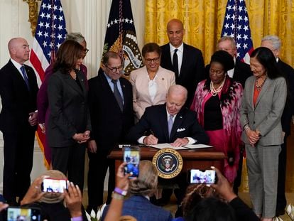 President Joe Biden signs an executive order in the East Room of the White House, May 25, 2022, in Washington.