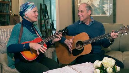 Lynda Shannon Bluestein jams with her husband Paul in the living room of their home, on February 28, 2023, in Bridgeport, Connecticut.