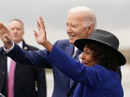 U.S. Rep. Maxine Waters (D-CA) and U.S. President Joe Biden wave upon his arrival in Los Angeles, California, U.S., February 20, 2024.