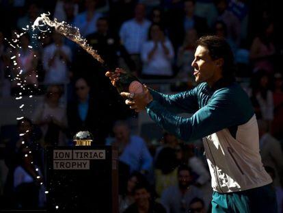 Rafa Nadal celebrates his Madrid Masters triumph with cava after defeating Stanislas Wawrinka in the final.