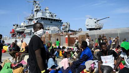Migrants wait to be transferred from Lampedusa Island, Italy, Friday, Sept. 15, 2023.