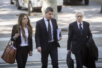 Leo Messi's defense team arrive at court in Barcelona on Tuesday.