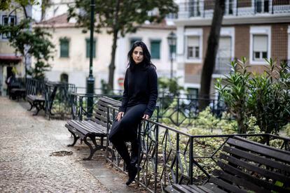 Writer Deepti Kapoor poses in Praça das Flores – a square in Lisbon, Portugal – in mid-January.