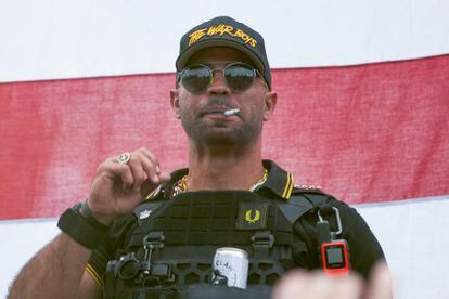 Proud Boys leader Henry "Enrique" Tarrio wears a hat that says The War Boys during a rally in Portland, Ore., on Sept. 26, 2020.