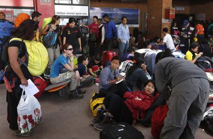 Foreign tourists and climbers waiting at the airport for a flight out of Nepal following the earthquake on Saturday.