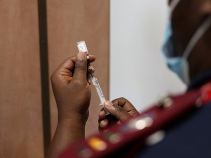 A nurse prepares a Covid-19 vaccine in South Africa.