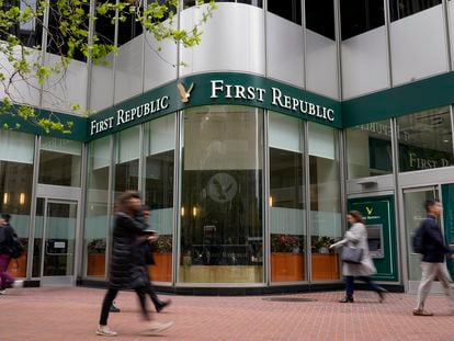 Pedestrians walk past the headquarters of First Republic Bank in San Francisco, on May 1, 2023.
