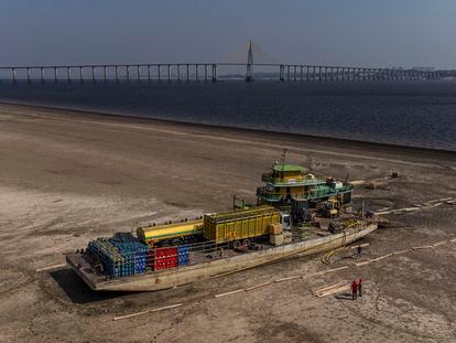 A tugboat and a ferry stranded due to the severe drought that’s hitting the rivers of the Amazon basin, in the municipality of Iranduba, near Manaus, the capital of the Brazilian state of Amazonas.