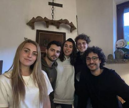 Adrián Fernández (2nd left) in the country house where he has taken refuge. 