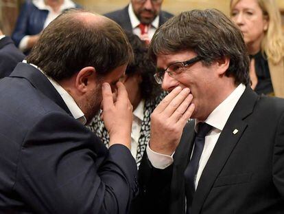 Catalan Premier Carles Puigdemont and his deputy Oriol Junqueras on Tuesday.