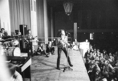 The Doors, performing in Germany in 1968. In the background, Robby Krieger on guitar; at center stage, Jim Morrison.