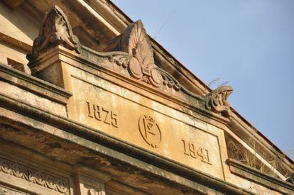 A detail of the Torre de la Sagrera entrance, showing its construction dates.