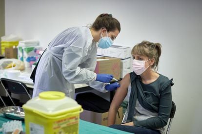 Health personnel administering the first doses of the AstraZeneca vaccine in Girona, Catalonia.