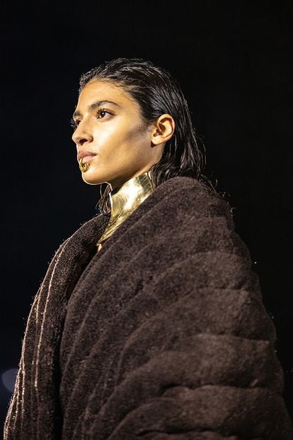 A model wears a lip ring at Balmain's spring-summer fashion show in Paris.