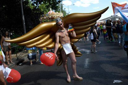 A winged member of the Gay Pride parade.