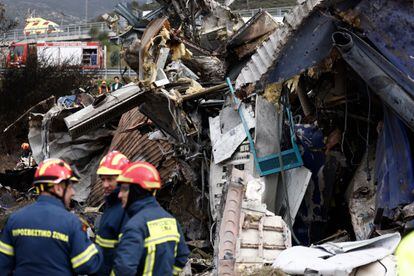 Rescuers in front of the train wreckage in Larissa on March 1.