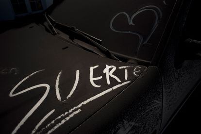 The word "good luck" written on an ash-covered car in Tajuya, on La Palma, on Wednesday. 