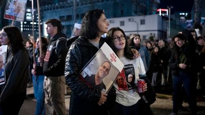 Women listen to a speaker during a weekly rally calling for the release of hostages who were kidnapped on Oct. 7, 2023, in Tel Aviv, Israel, Saturday, Feb. 3, 2024.
