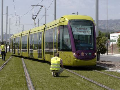 Technicians inspect one of Ja&eacute;n&rsquo;s trams during a testing period in June 2012. 