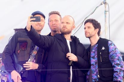 From left to right, Jonny Buckland (guitar), Chris Martin (vocals), Will Champion (drums) and Guy Berryman (bass), in London, in May 2021, at the Brit Awards.