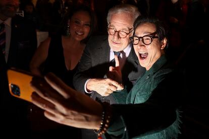 Steven Spielberg and Ke Huy Quan take a selfie at the Oscars nominee lunch in Beverly Hills on February 13.