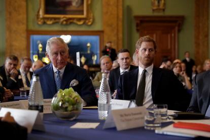 Prince Harry and King Charles at a meeting for the International Year of the Reef at Fishmongers Hall on Feb. 14, 2018, in London.